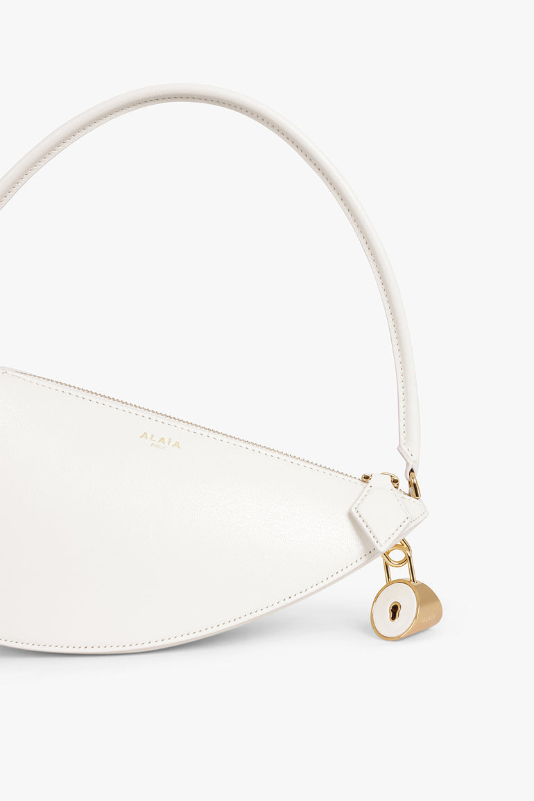 ALAIA BAGS WHITE / IVOIRE Le Demi Coeur Half Heart Shoulder Bag | Ivory